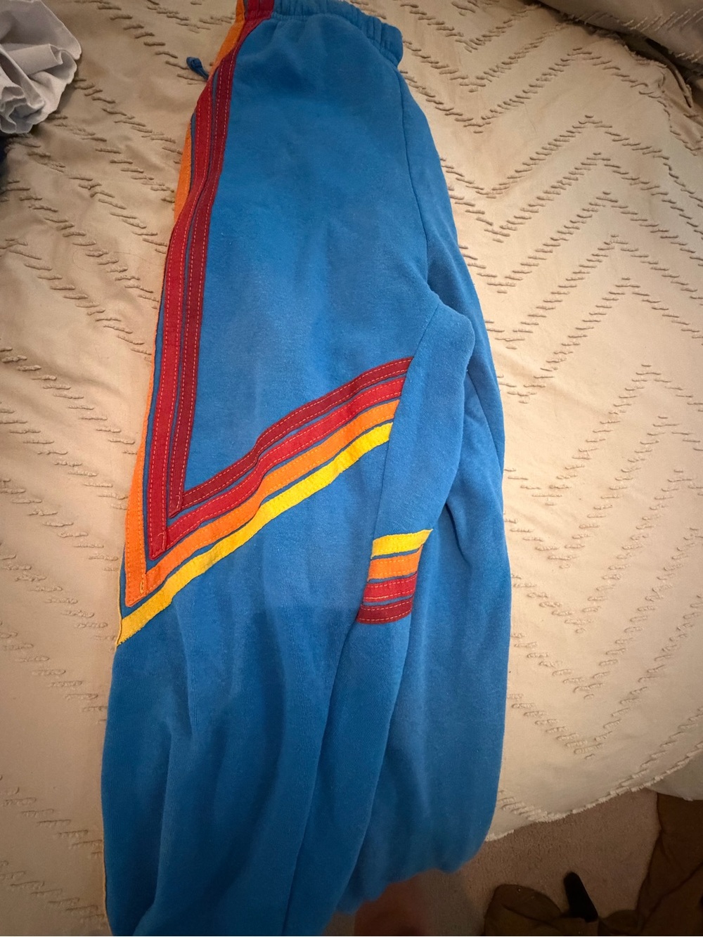 Aviator Nation Blue Track Pants with Red and Yellow Stripe Detail
